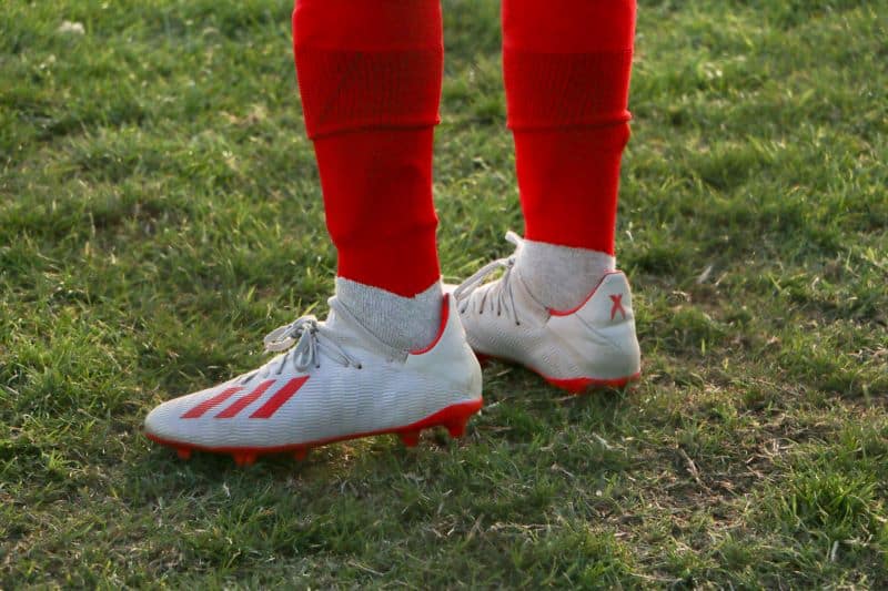 soccer player wearing low-cut cleats