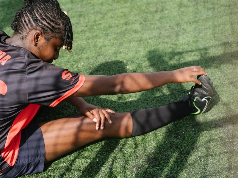 black female player warming up before a game